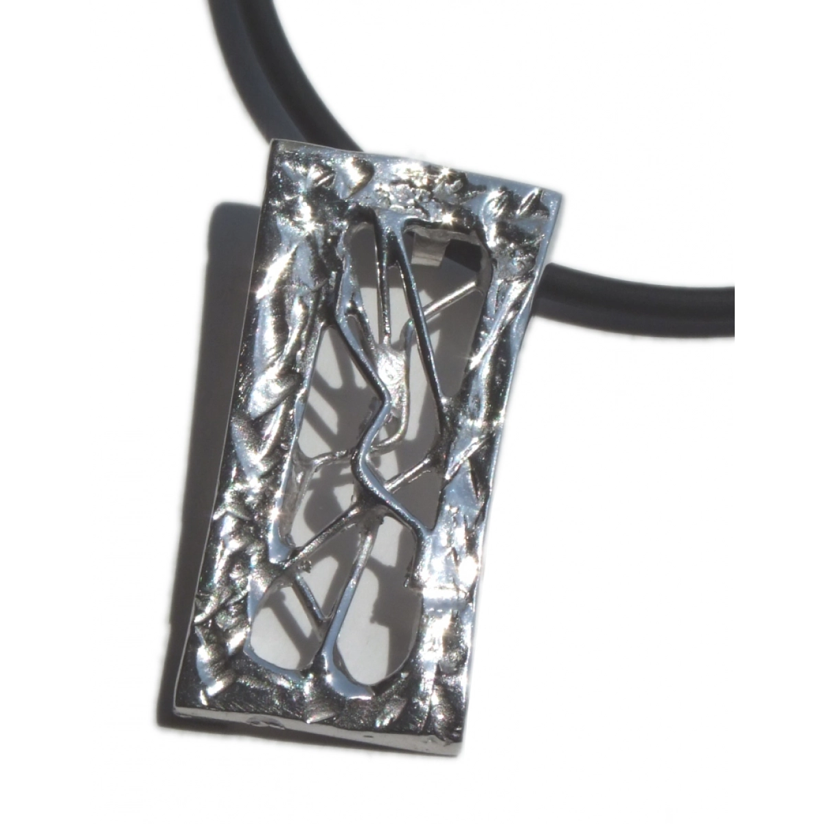 Pendant in silver, the slides collection. Dimensions: 5 X 2.2 cm FP C32-P Fili Plaza