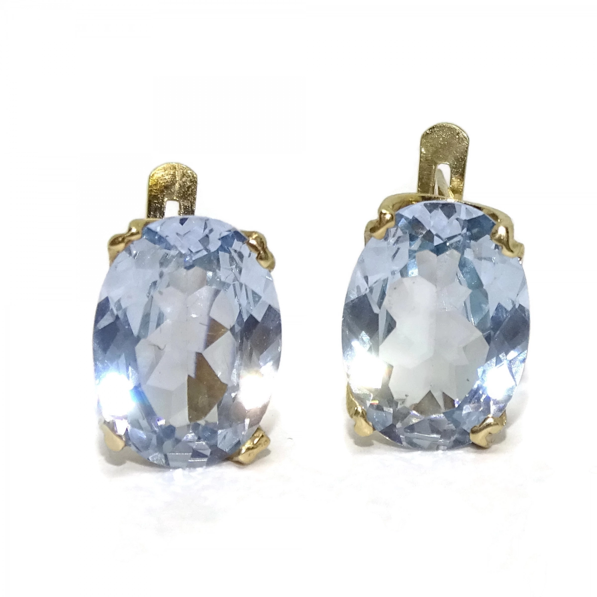 EARRINGS OF YELLOW GOLD OF 18KTES WITH ZIRCONS BLUE 1.2 CM BY 0.9 CM LOCKING BLADE Never say never