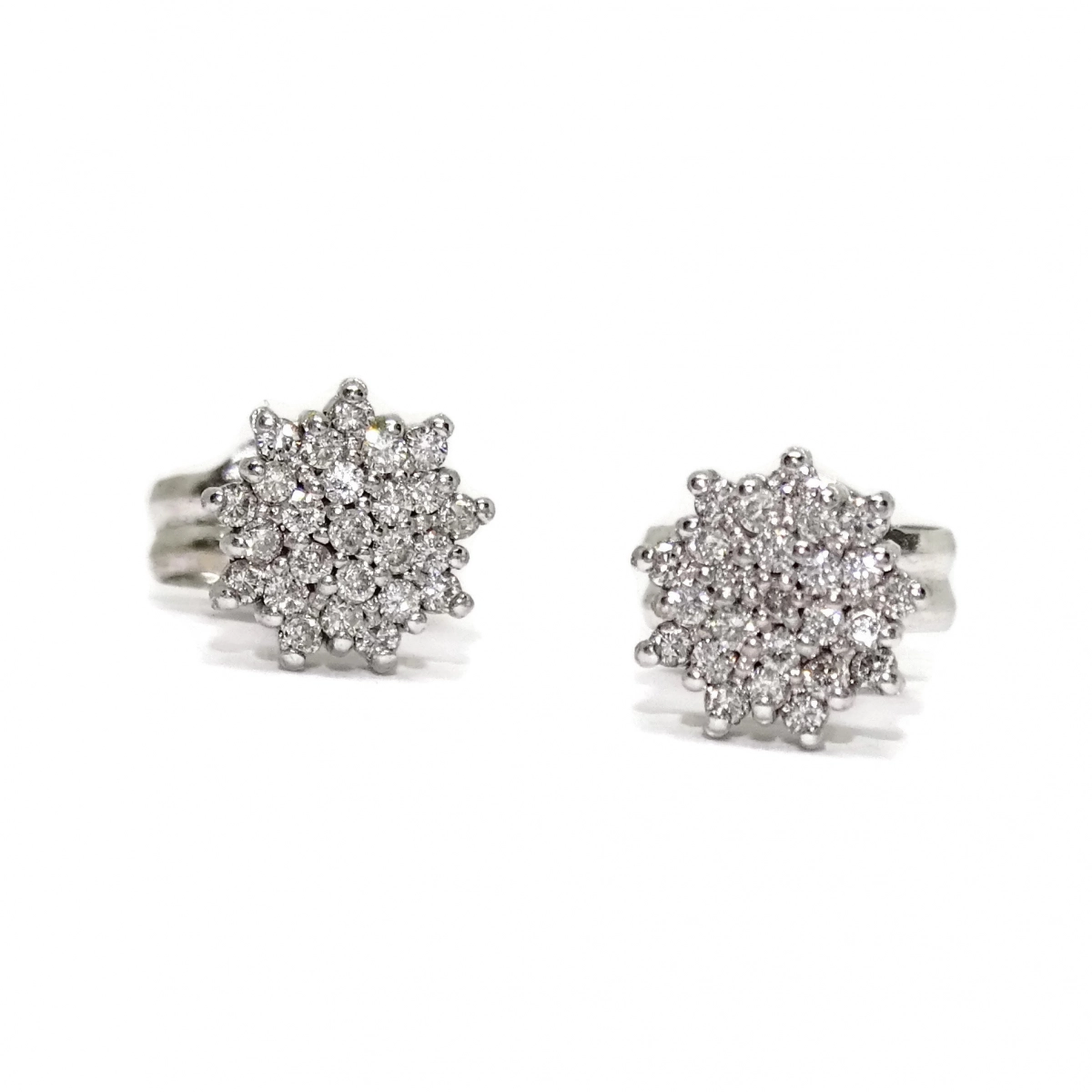 DIAMOND EARRINGS 0.20 CTS AND 18K WHITE GOLD WITH THE FORM OF A ROSET�N. CLOSING PRESSURE�N. 0.70 CM NEVER SAY NEVER