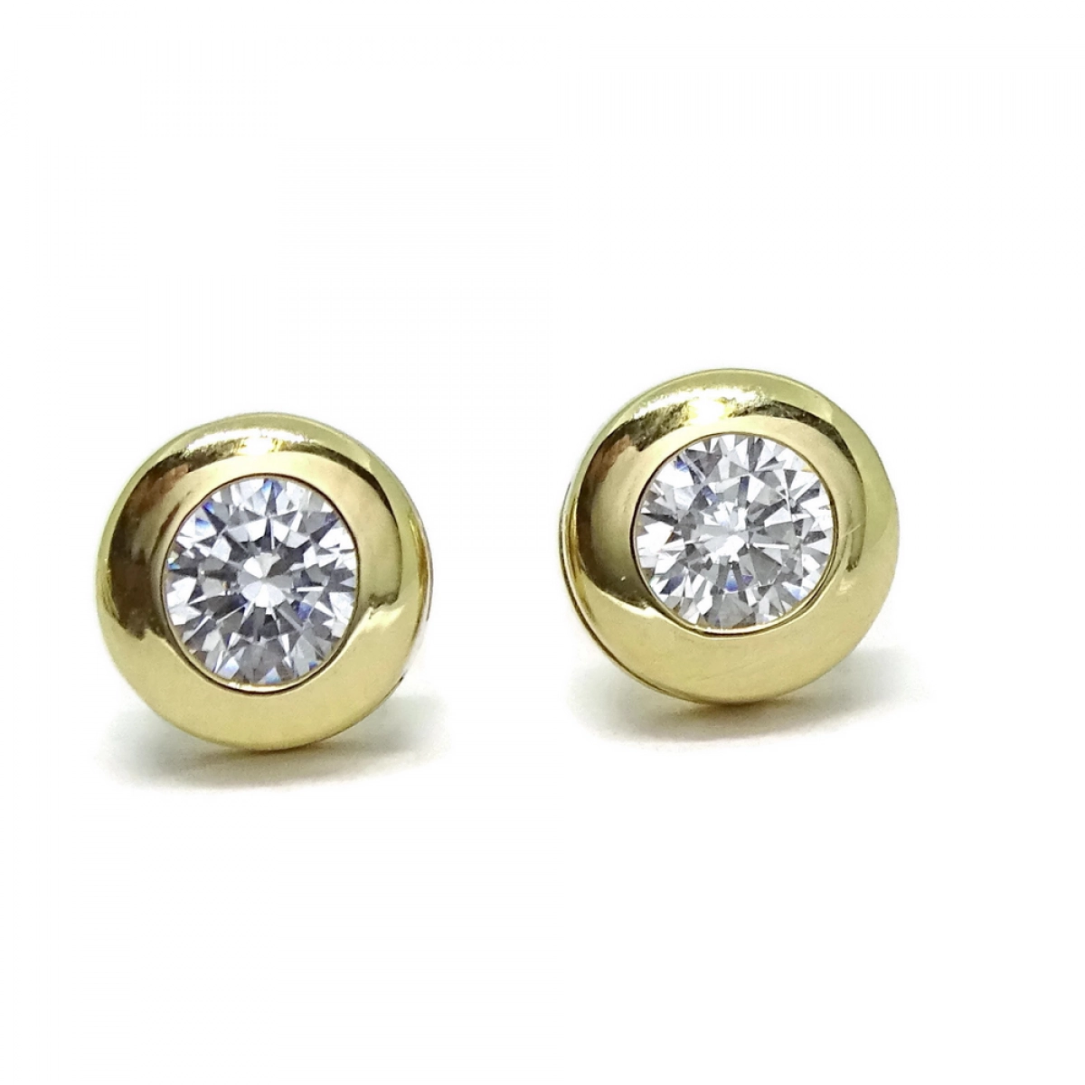 GOLD 18KTES OF 6.5 MM AND CUBIC ZIRCONIA EARRINGS. NEVER SAY NEVER