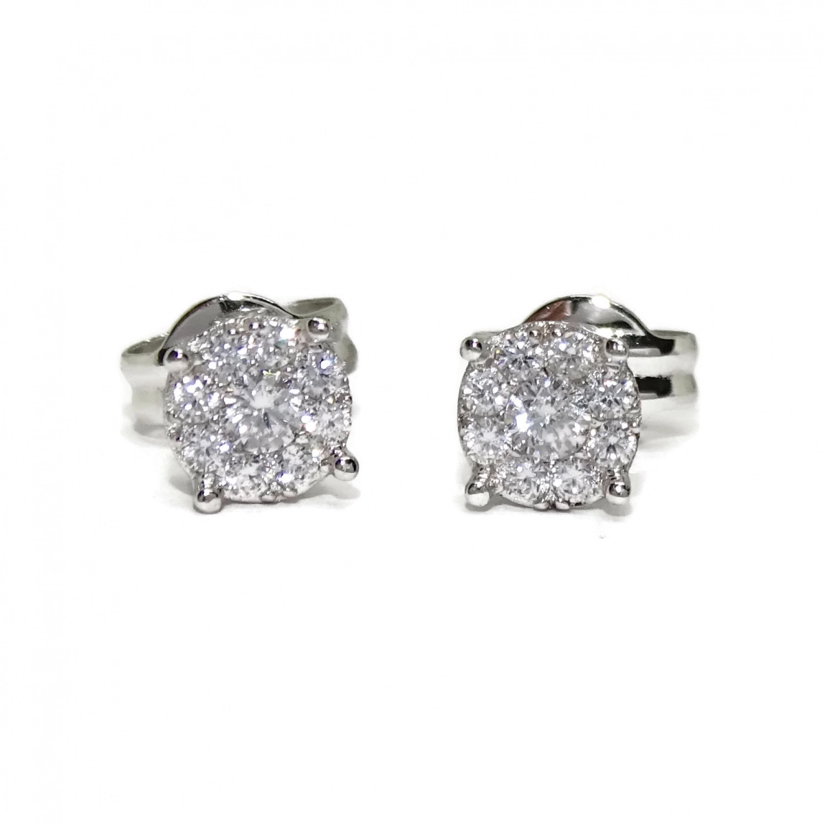 PRECIOUS EARRINGS OF WHITE GOLD OF 18KTES WITH 18 ZIRCONS OF THE BEST QUALITY. NEVER SAY NEVER