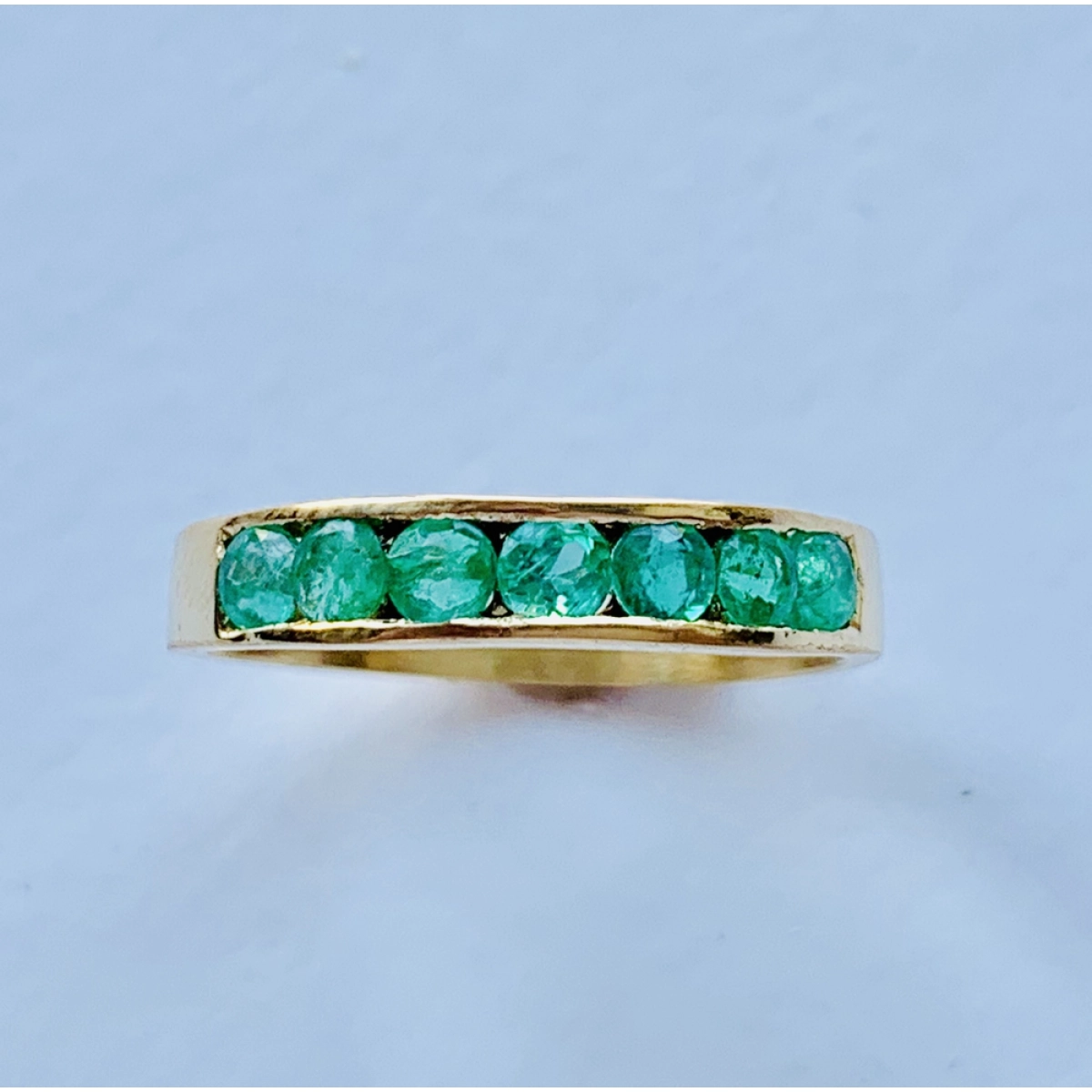 RING OF EMERALDS IN 18K GOLD